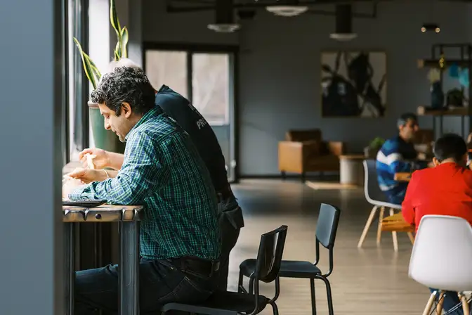 Two men eating lunch